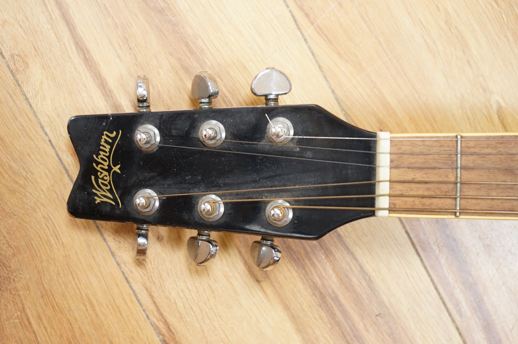 A Washburn festival series, 10mb electric-acoustic guitar